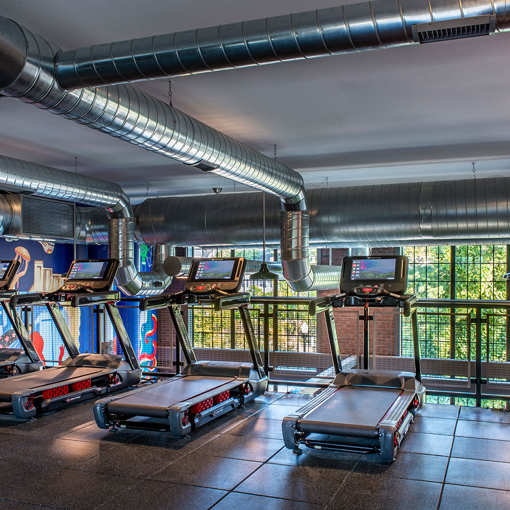 Treadmills on second floor of the gym space at Halstead Salem Station