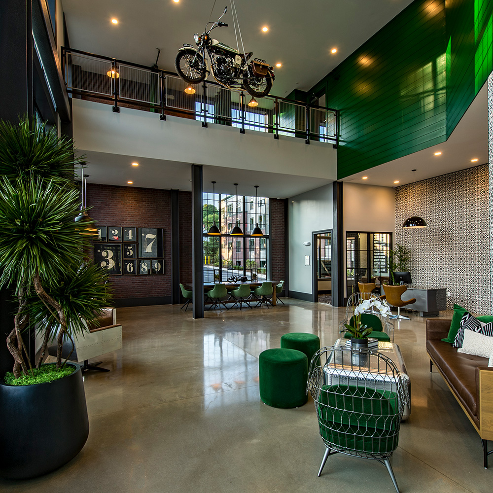 Double height business center at luxury apartment complex: Halstead Salem Station