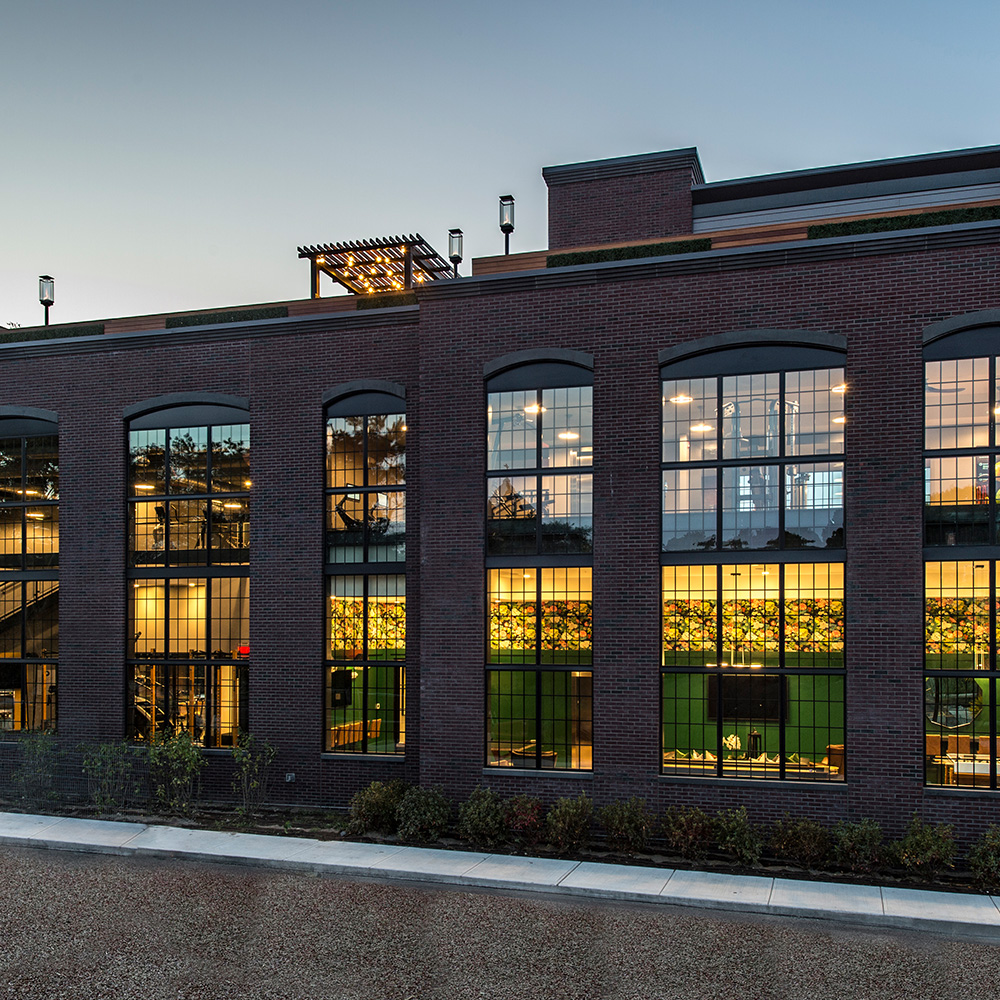 Exterior view into double height gym and business center at Halstead Salem Station
