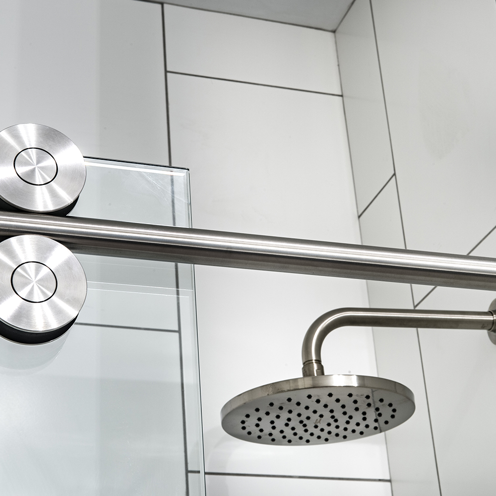 Detail shot of shower head in apartment bathroom at Halstead Salem Station