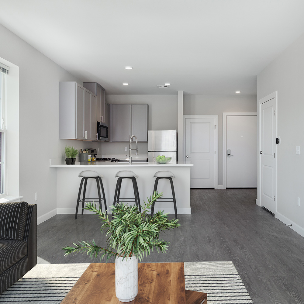 View from living room looking toward open concept kitchen at Halstead Salem Station
