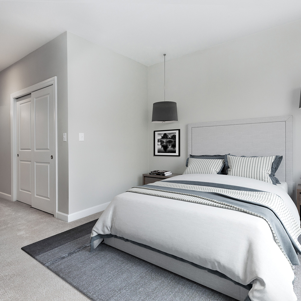 Spacious, modern bedroom in luxury apartment at Halstead Salem Station